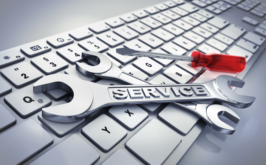 Computer keyboard with spanners showing the relationship between hard services and soft services in Facility Management. Strata Property Maintenance Melbourne