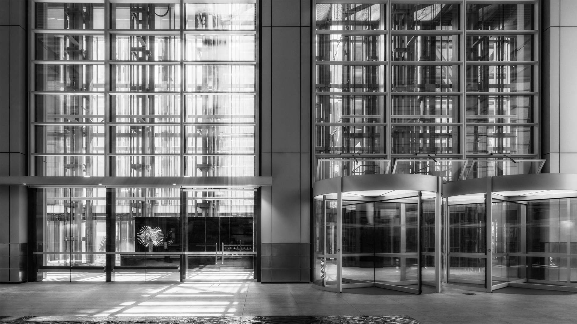 Contractor and Maintenance Management - black and white picture of a large commercial building facade at night in Sydney
