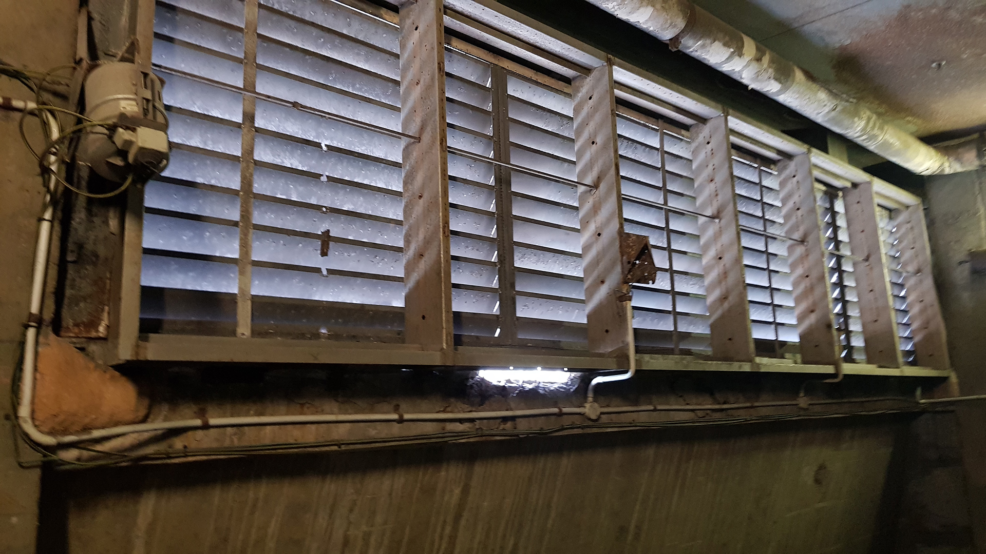 technical due diligence  - Pneumatic Actuator controls and modulates this large bank of outside air dampers serving a main Air handling unit in North Sydney Building 