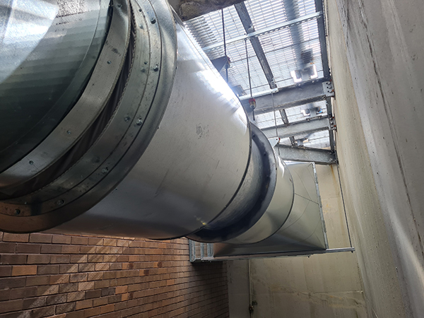 stair pressure smoke relief air fan built on to the roof of a sydney commercial building