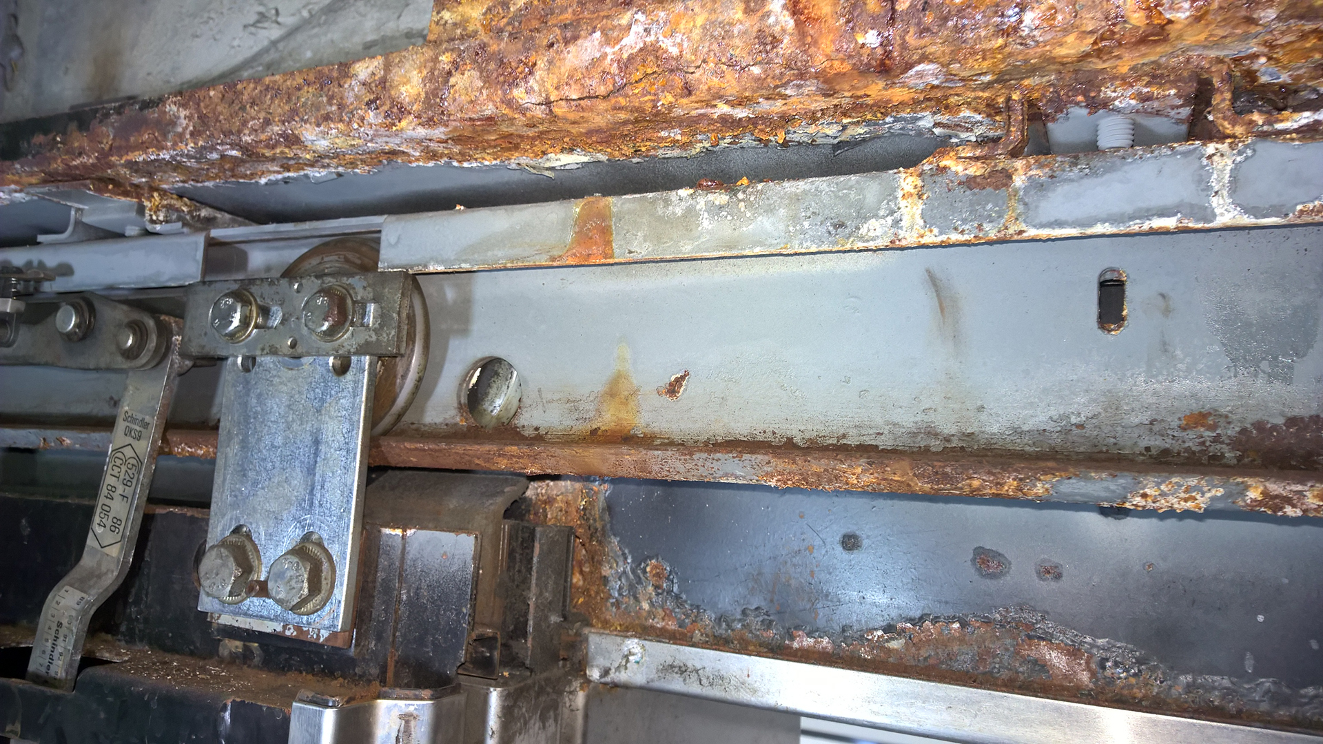 Elevator Door mechanisium rusted beyond repairs - elevator switched off permantly until all elevators are in modernization program