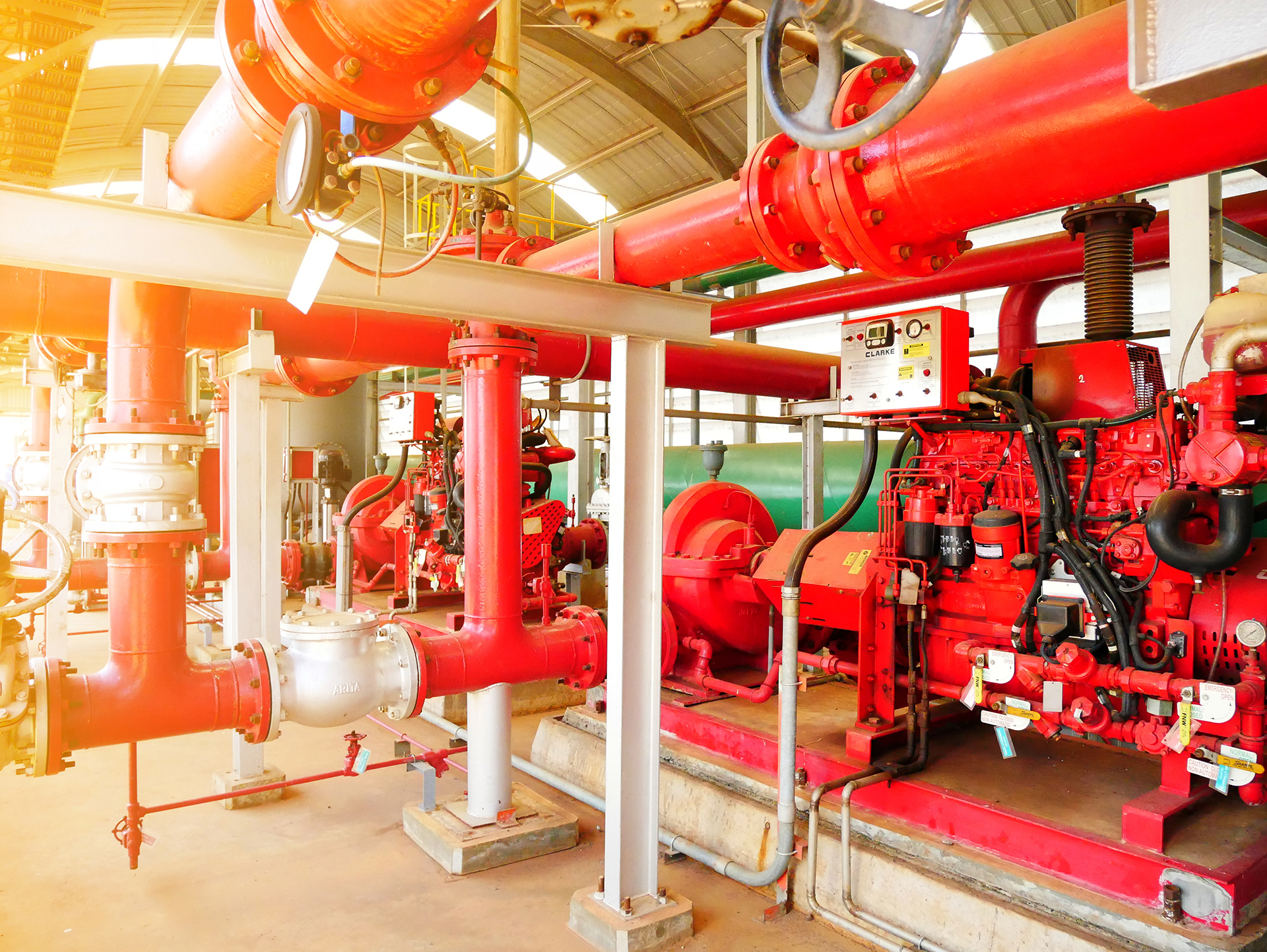Commercial Property Asset Registers – Image Description
A detailed image of a commercial building fire services plant room featuring major fixed fire protection infrastructure, including fire pumps, electric motors, diesel backup pumps, jockey pumps, pipework, valves, pressure gauges, flow switches, control panels, water storage systems, and associated fire protection equipment. The image highlights the complexity and scale of critical life-safety assets that require accurate identification, documentation, and lifecycle management within a comprehensive commercial property asset register.
The interconnected equipment demonstrates the importance of maintaining detailed asset records for compliance, preventative maintenance, capital planning, risk management, and operational reliability. Each component represents a valuable asset that should be recorded with its location, manufacturer, model number, serial number, service history, installation date, and expected replacement lifecycle. The image reflects the technical diligence required to manage fire protection systems effectively while supporting building owners, facility managers, property managers, and asset managers in meeting their compliance obligations and protecting building occupants.
Ideal for content relating to commercial property asset registers, fire protection asset audits, technical due diligence, building compliance, facility management, lifecycle planning, and critical infrastructure management across commercial office buildings, shopping centres, industrial facilities, healthcare facilities, hotels, mixed-use developments, and strata properties throughout Melbourne, Sydney, Canberra, Brisbane, Adelaide, and Perth.