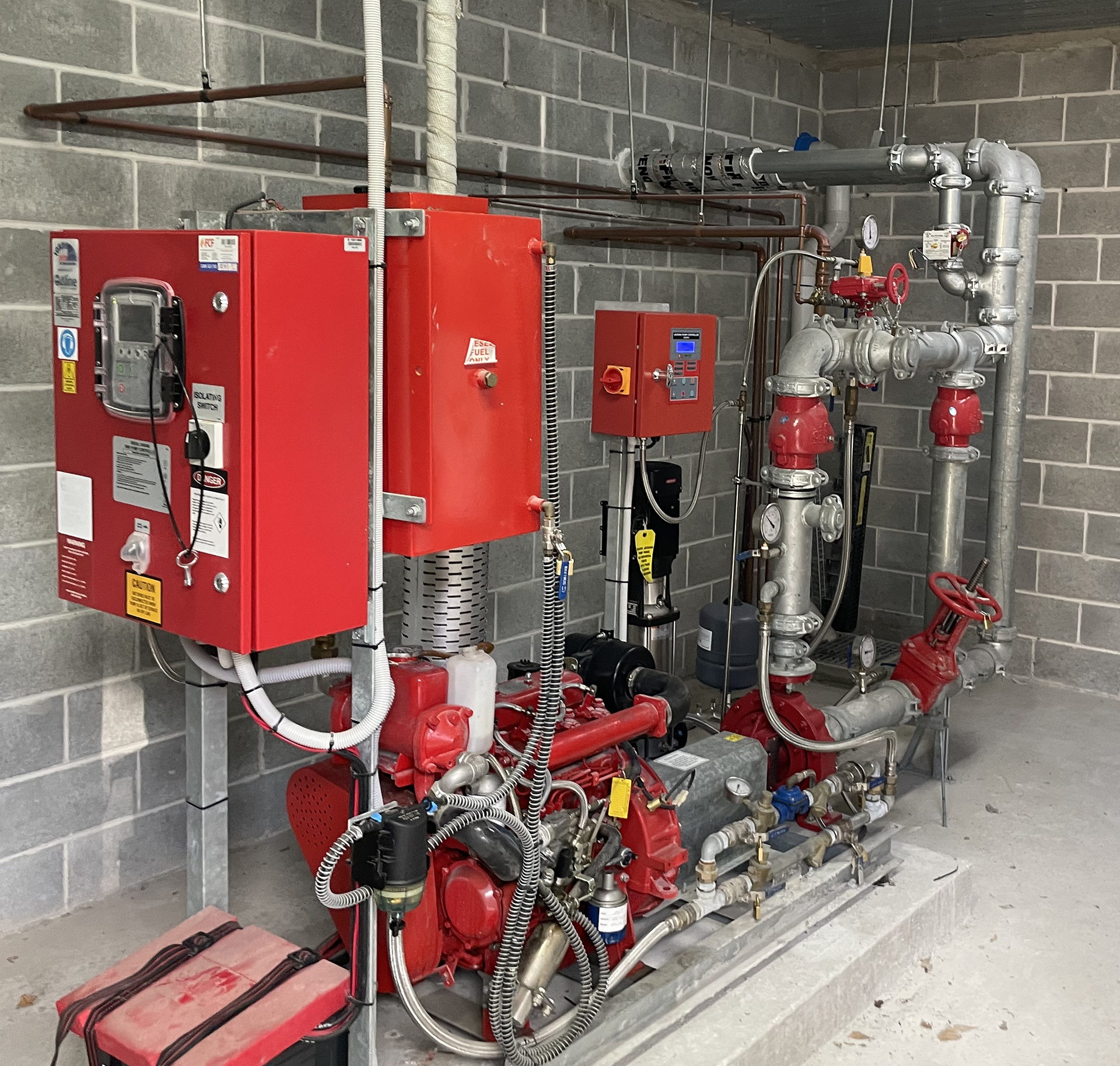 Diesel-driven fire hydrant pump serving a commercial building fire protection system in Sydney.