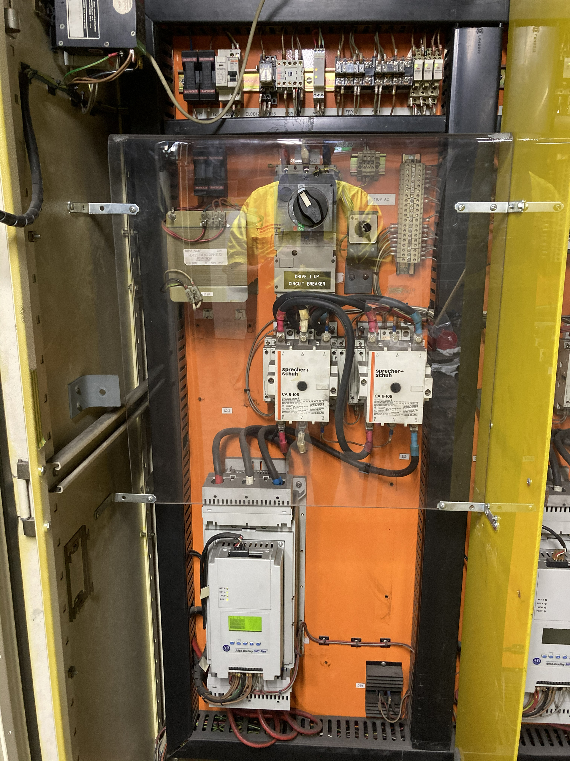 PLC control panel and variable speed drive controlling a commercial travelator at Domain Sydney during maintenance and inspection.