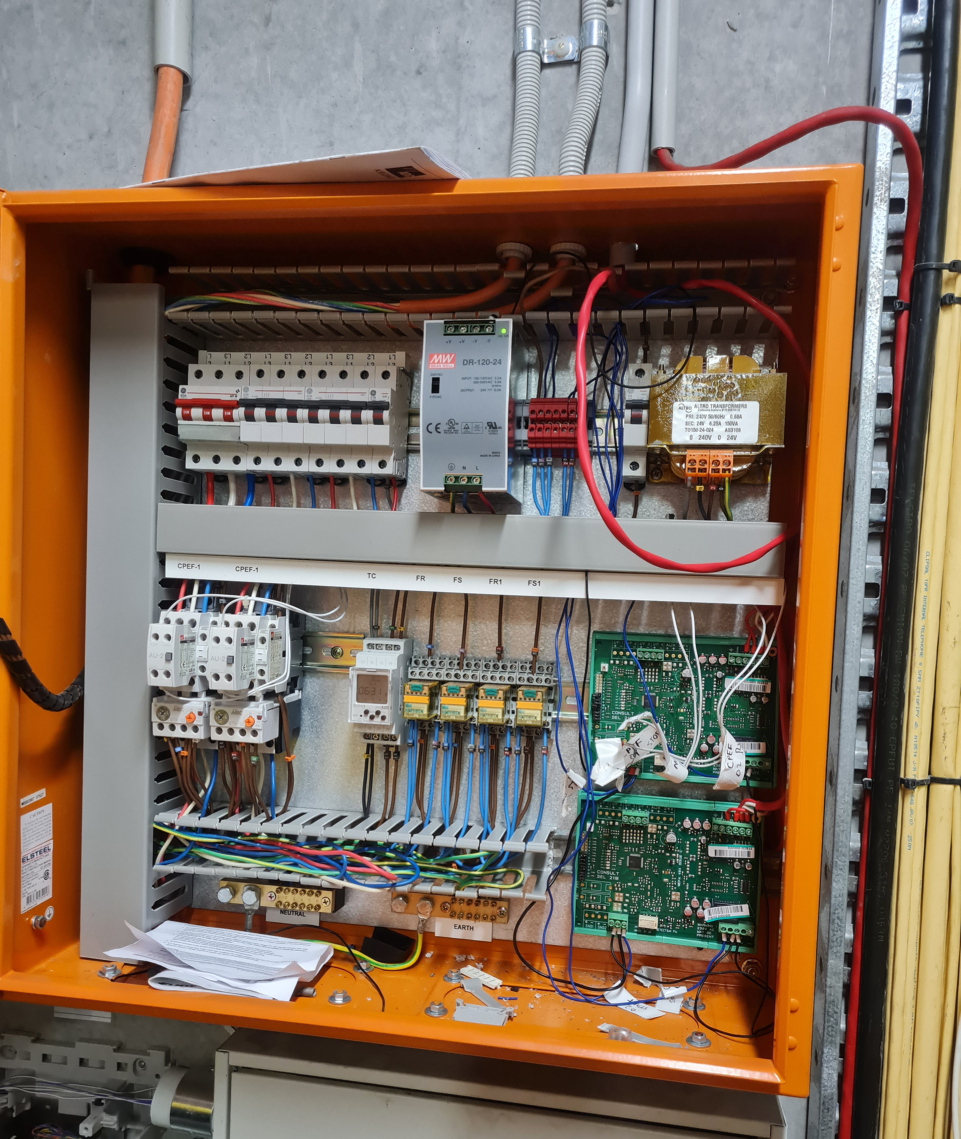 Mechanical Services Switchboard (MSSB) with HVAC controls, fire system interface relays and electrical control components in a commercial building in Melbourne.